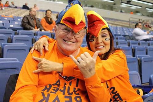 Mike and Gloria Anderson at a 世界杯官方app football game